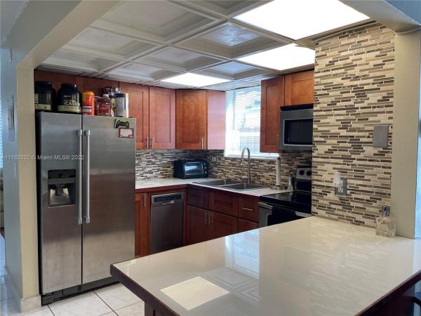 Swiss Chalet Townhouse, 10942 SW 3rd St #D1, Sweetwater, Florida 33174, image 2