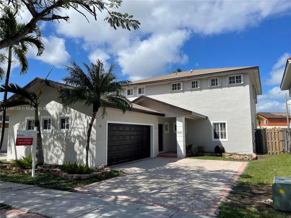 Adventure Homes, 14747 SW 141st Ter, Country Walk, Florida 33196, image 2