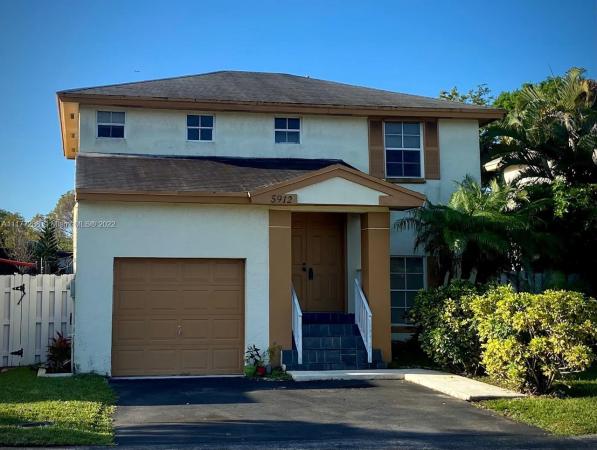 Villas At Woodland Greens, 5912 Woodland Point Pl, Tamarac, Florida 33319, image 1