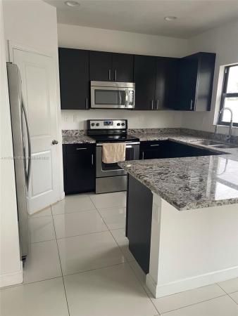 Champion Lakes, 424 NE 194th Ter, Ives Estates, Florida 33179, image 2