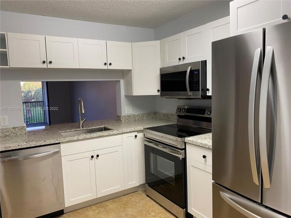 Villas At Meadow Lakes, 1230 S Military Trl #2021, Deerfield Beach, Florida 33442, image 2