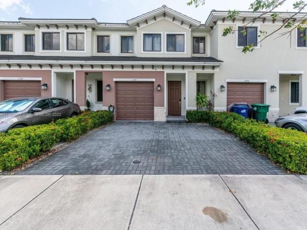 Hidden Lake Townhomes, 12748 SW 131st Ter #12748, Three Lakes, Florida 33186, image 1