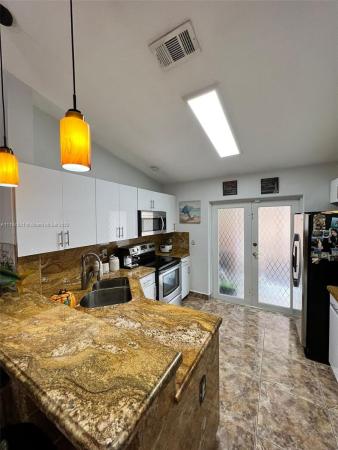 Garden Villas, 10937 W Okeechobee Rd #202, Hialeah Gardens, Florida 33018, image 1