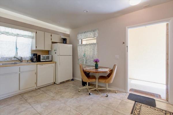 Villas At Carriage Hills Lakeside, 2 Briarwood Cir #107, Hollywood, Florida 33024, image 2