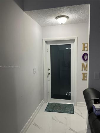 Country Lake Homes, 18868 NW 63rd Ct Cir, Country Club, Florida 33015, image 1