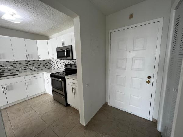 Coral Gate West, 7010 NW 186th St #5-506, Country Club, Florida 33015, image 2