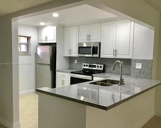 Sherwood Square, 1100 NW 87th Ave #304, Coral Springs, Florida 33071, image 1