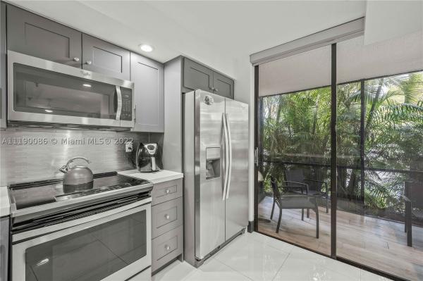 Coco Wood, 661 NE 195th St #105, Ives Estates, Florida 33179, image 1