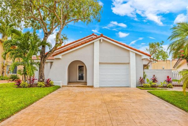 Patio Homes At The Moors, 17413 NW 61st Ct, Country Club, Florida 33015, image 1