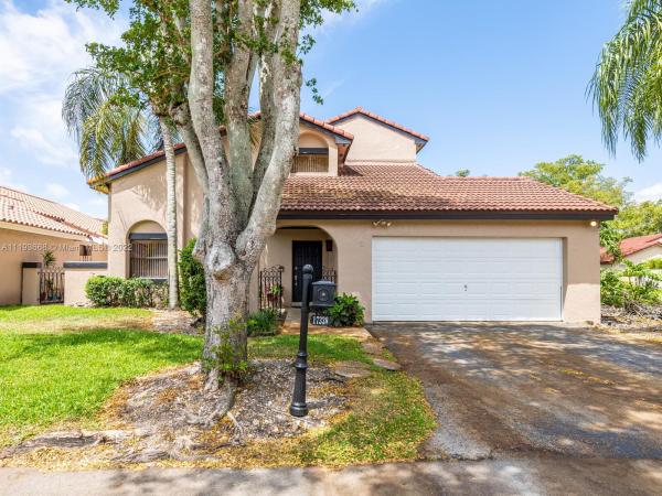 Patio Homes At The Moors, 17338 NW 61st Pl, Country Club, Florida 33015, image 1