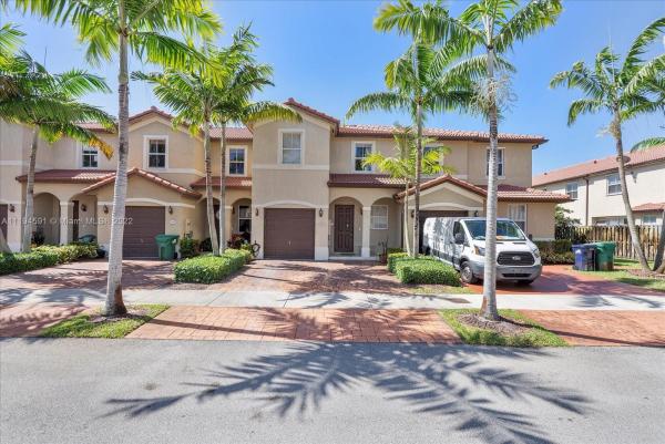Ives Dairy Townhomes, 1020 NE 207th Ter, Ives Estates, Florida 33179, image 1