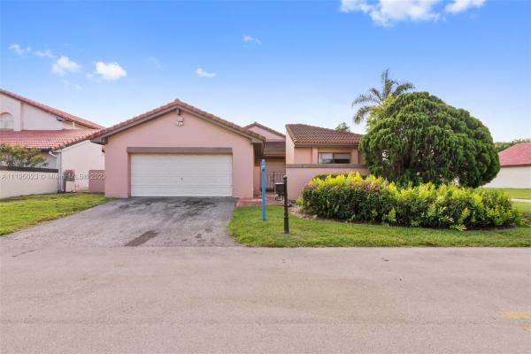 Patio Homes At The Moors, 17345 NW 62nd Pl, Country Club, Florida 33015, image 1