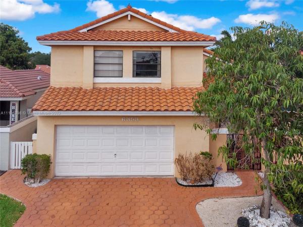 The Moors Cluster Homes, 6353 NW 173rd St, Country Club, Florida 33015, image 1
