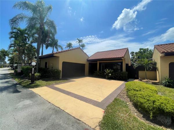 California Club Homes, 1040 NE 204th Ter, Ives Estates, Florida 33179, image 1
