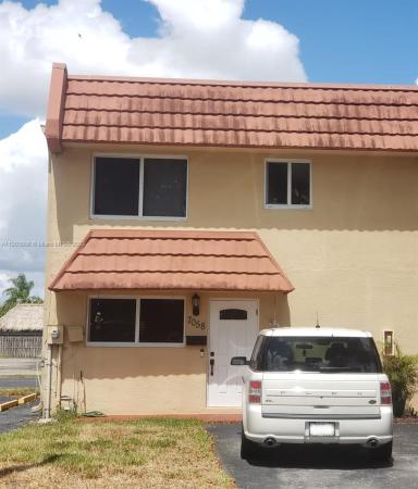 Ludlum Lake Townhouses 2, 7058 NW 169th St #7058, Country Club, Florida 33015, image 1