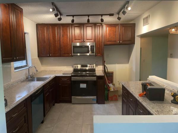 Summertree Village, 481 Ives Dairy Rd #403-4, Ives Estates, Florida 33179, image 2