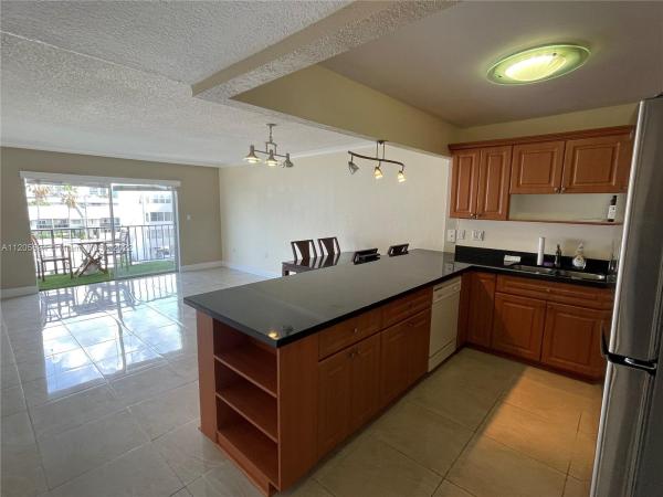 Caribbean House, 3665 NE 167th St #406, North Miami Beach, Florida 33160, image 1