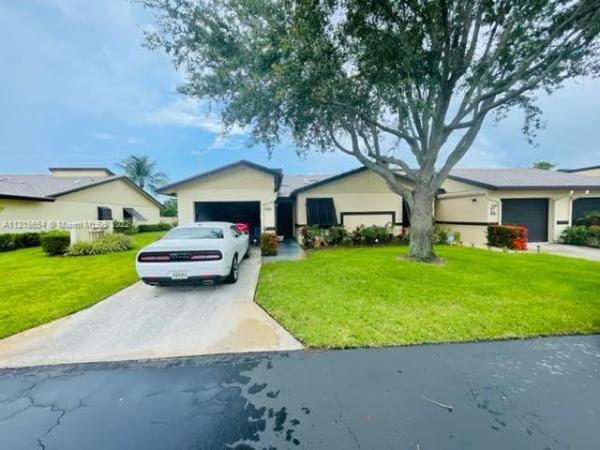 Ridgepointe Woods Villas, 12 Ridge Pointe Dr #A, Boynton Beach, Florida 33435, image 1