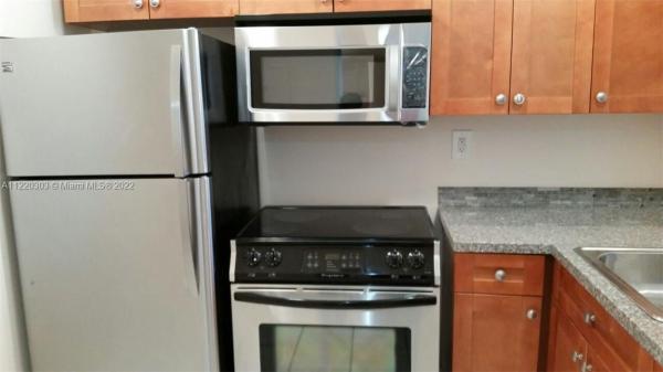 Montecarlo, 492 NW 165th Street Rd #C210, Golden Glades, Florida 33169, image 2