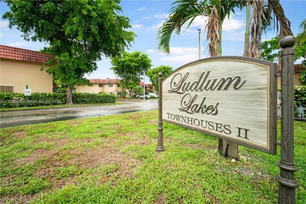 Ludlum Lake Townhouses 2, 7034 NW 169th St #7034, Country Club, Florida 33015, image 1