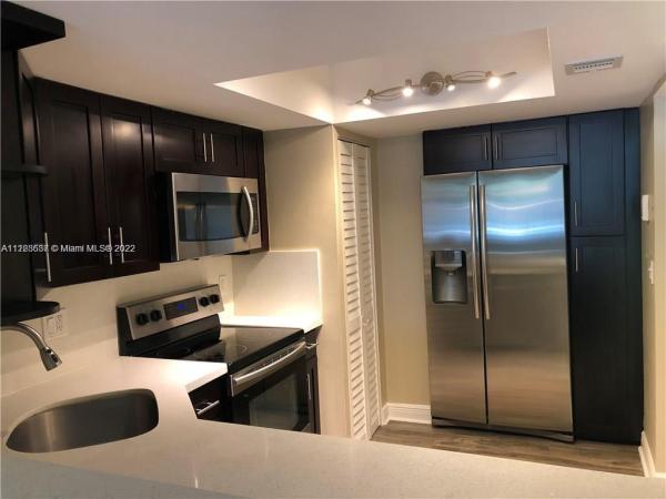 Palm Court At Coral Springs, 3241 Riverside Dr #D-101, Coral Springs, Florida 33065, image 1