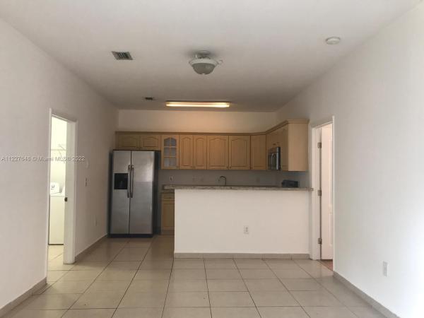 Lilandia Estates, 7532 NW 177th Ter #7532, Country Club, Florida 33015, image 1