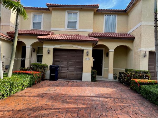 Ives Dairy Townhomes, 1015 NE 208th St, Ives Estates, Florida 33179, image 1