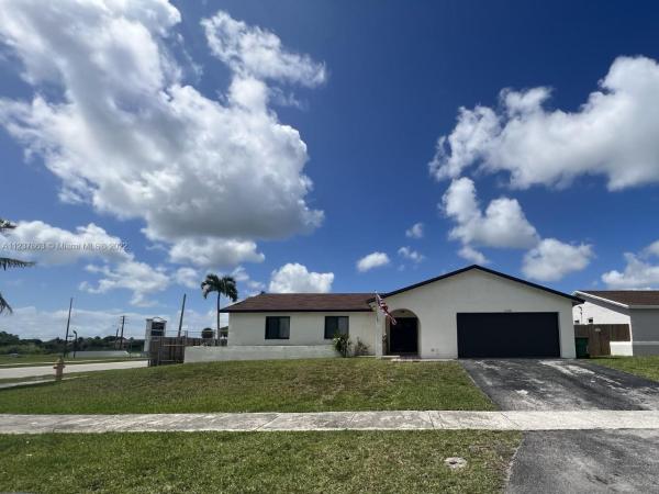 Meadow Wood Manor, 12200 SW 267th Ter, Three Lakes, Florida 33032, image 1