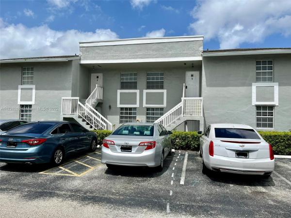 Monterey Village, 486 NE 210th Circle Ter #204, Ives Estates, Florida 33179, image 1