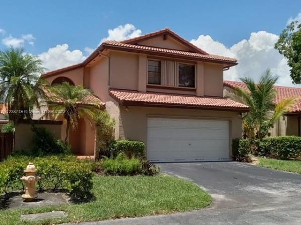 The Moors Cluster Homes, 6316 NE 174th Ter, Country Club, Florida 33015, image 1