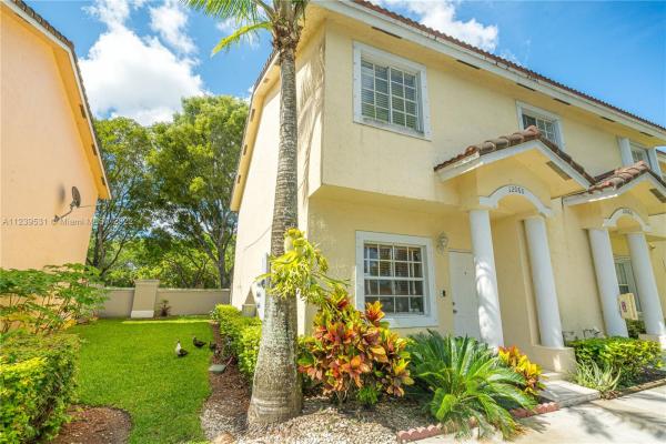 Bonita Villas, 12060 SW 143rd Ln #1-6, Three Lakes, Florida 33186, image 1