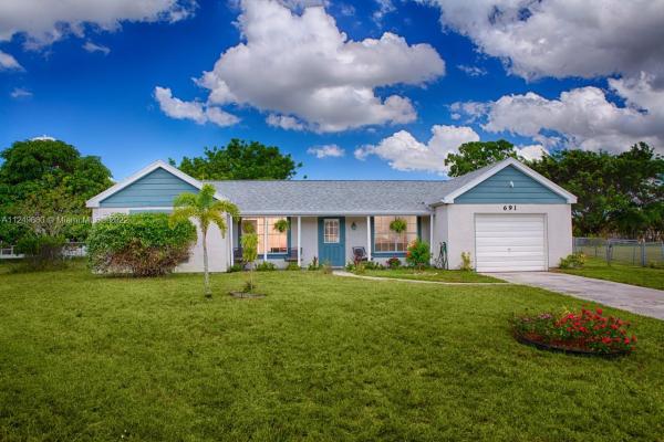 691 SW Everett Ct, Florida 34953, image 2