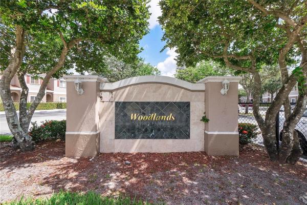 The Woodlands Villas, 4412 Woodland Cir, Tamarac, Florida 33319, image 1