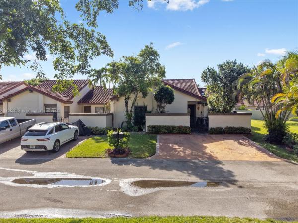 The Moors Townhouses, 17831 NW 66th Ct, Country Club, Florida 33015, image 1