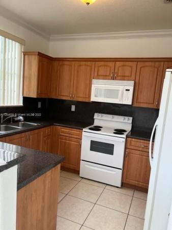 Shoma Villas At Country Club Of Miami, 7377 NW 174th Ter #104, Country Club, Florida 33015, image 1