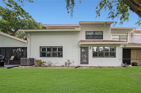 The Townhomes Of Deer Creek, 739 Deer Creek North Shore Dr, Deerfield Beach, Florida 33442, image 1
