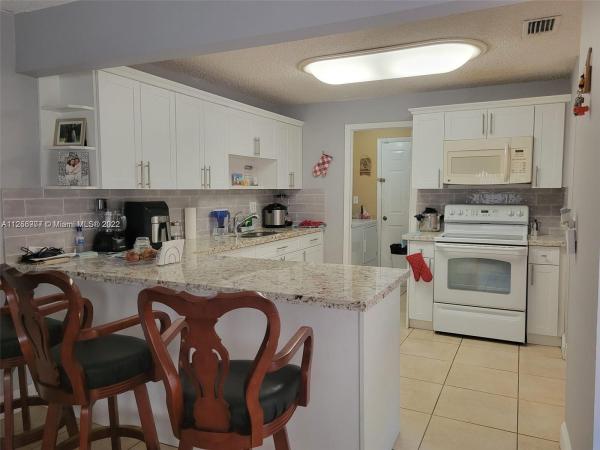 Twin Chalets At International Gardens, 11790 SW 16 St #a, Tamiami, Florida 33175, image 2