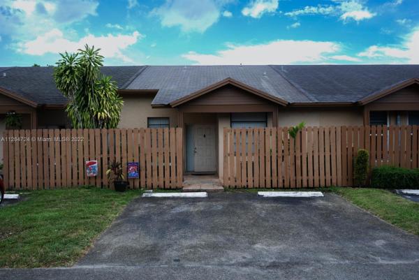 Aspen Townhomes, 6769 NW 186th Ter #6769, Country Club, Florida 33015, image 1