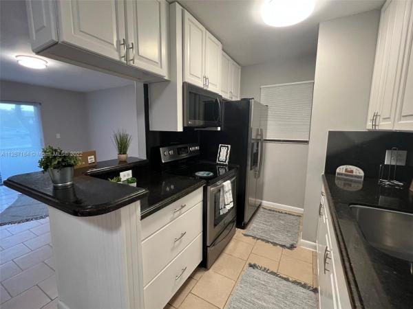 Tivoli Trace, 655 Trace Cir #105, Deerfield Beach, Florida 33441, image 1
