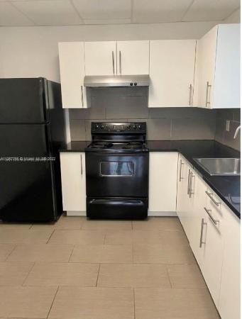 Mansion Townhouse, 15153 NE 6th Ave #10, Golden Glades, Florida 33162, image 1