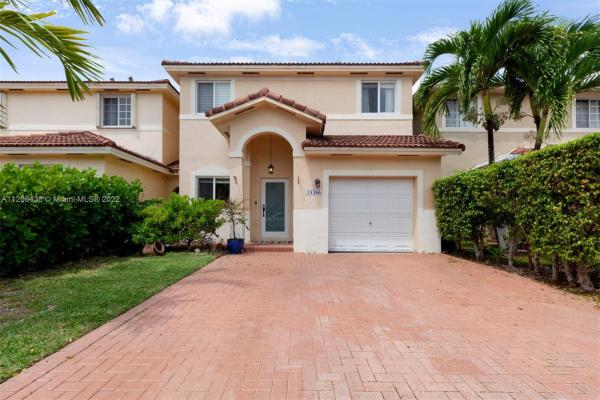 Precious Homes At Twin Lakes, 14366 SW 134th Pl, Three Lakes, Florida 33186, image 1