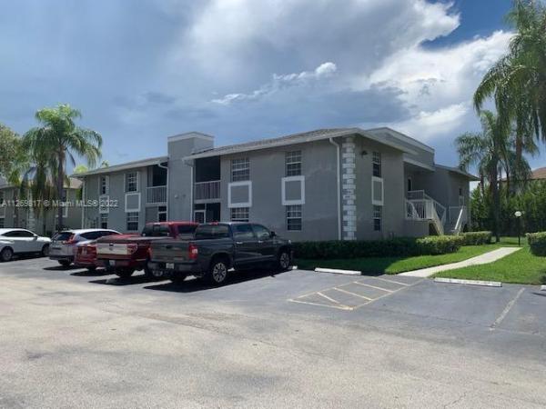 Monterey Village, 446 NE 210th Cir Ter #101-6A, Ives Estates, Florida 33179, image 1