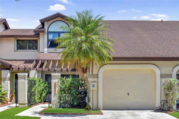 Valencia Townhomes, 10321 SW 137th Ct 0, The Hammocks, Florida 33186, image 1
