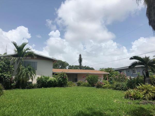 Mansionette Homes, 20320 NE 12th Ct, Ives Estates, Florida 33179, image 1