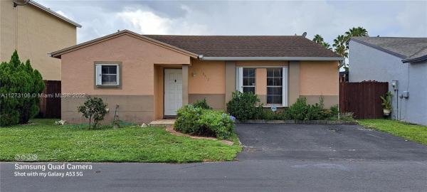 Country Lake Homes, 19912 NW 67th Ct, Country Club, Florida 33015, image 1