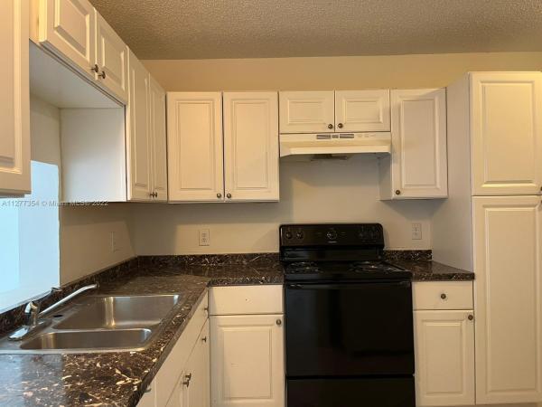 Cypress At Woodmont, 7355 Woodmont Ter #205, Tamarac, Florida 33321, image 1