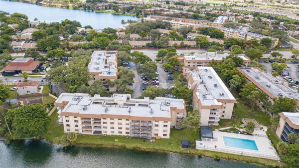 Summertree Village, 601 Ives Dairy Rd #402-8, Ives Estates, Florida 33179, image 1