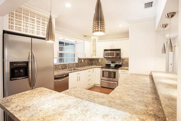 Millers Sunrise Estates, 10975 NW 27th Pl, Sunrise, Florida 33322, image 1