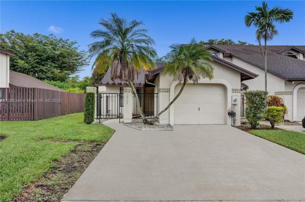 Valencia Townhomes, 13726 SW 103rd Ter 0, The Hammocks, Florida 33186, image 1