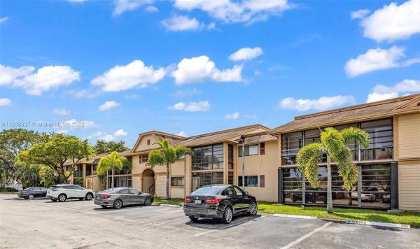 Countryside Village, 18815 NW 62nd Ave #103, Country Club, Florida 33015, image 1